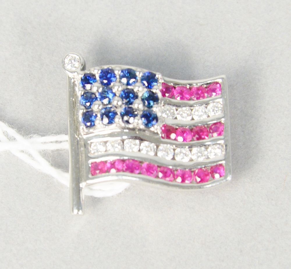 Appraisal: karat white gold diamond ruby and sapphire American flag pin