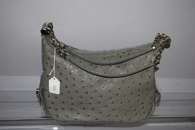 Appraisal: Judith Lieber gray ostrich leather handbag with zip top and