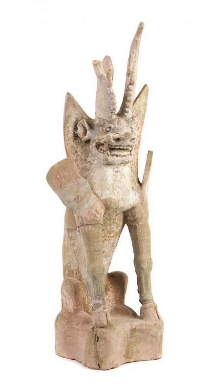 Appraisal: A Pottery Tomb Guardian Zhenmushou Height inches A Pottery Tomb