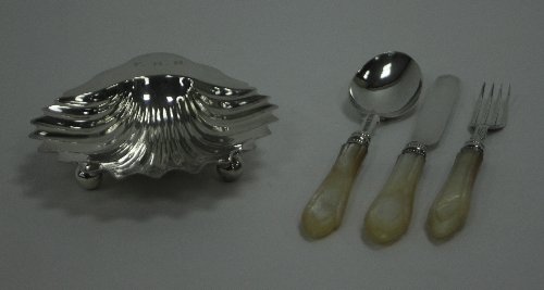 Appraisal: A Victorian silver christening set H T Birmingham with mother-of-pearl