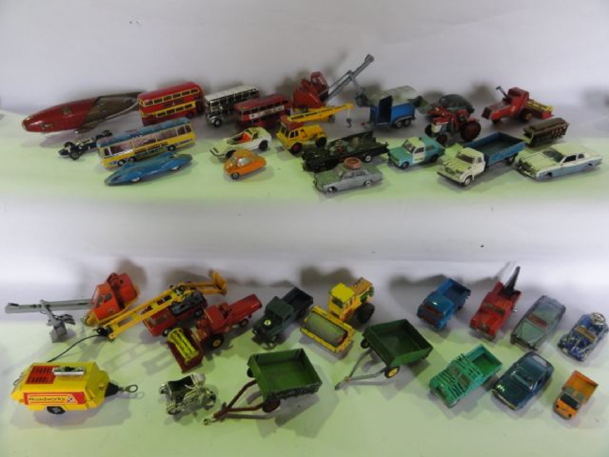 Appraisal: A box containing a mixed assortment of vintage model vehicles