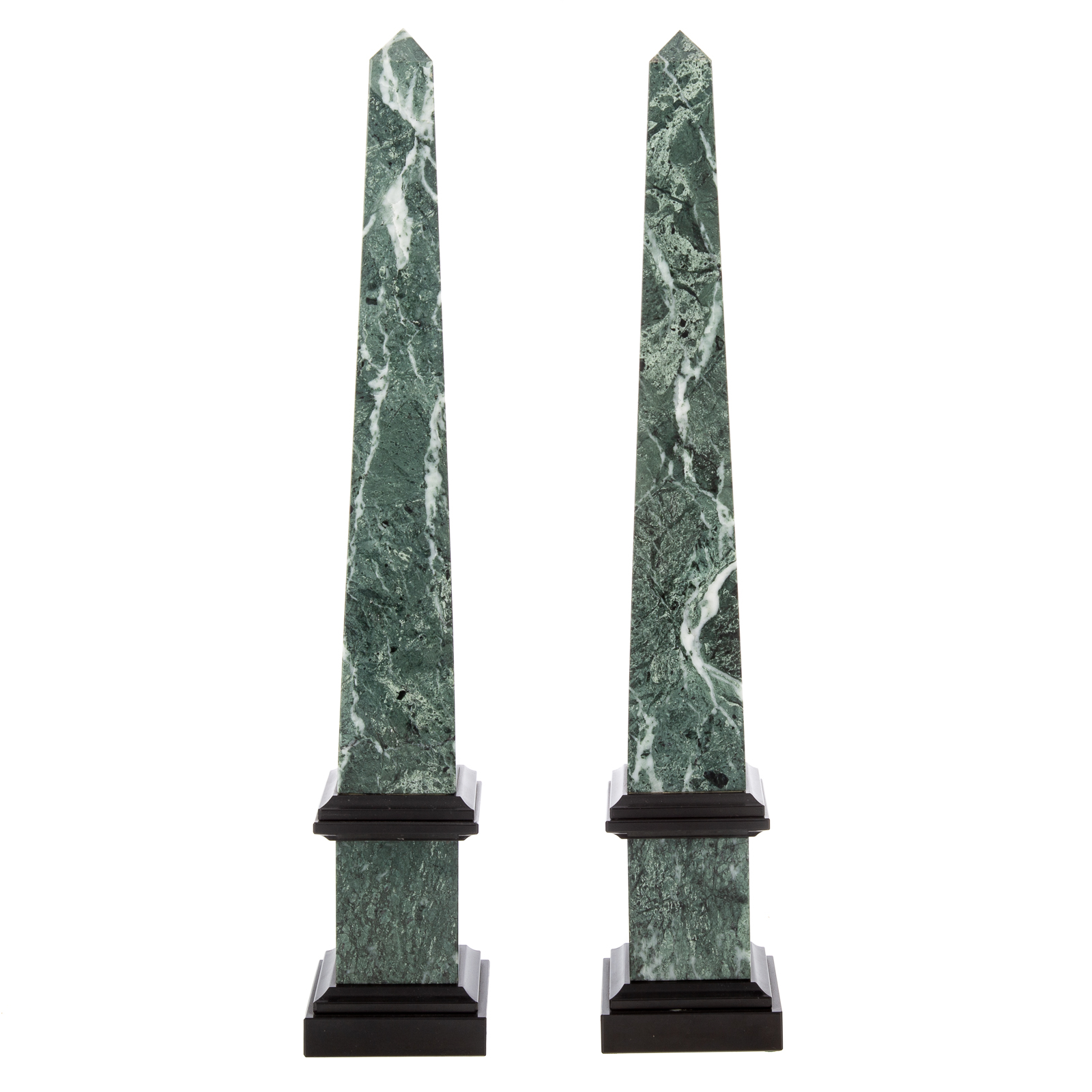 Appraisal: A PAIR OF CLASSICAL STYLE ONYX OBELISKS th century retailed