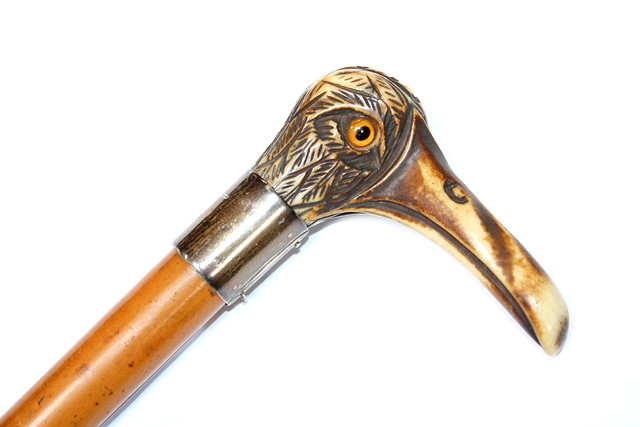 Appraisal: A LATE VICTORIAN MALACCA CANE WALKING STICK with carved bone