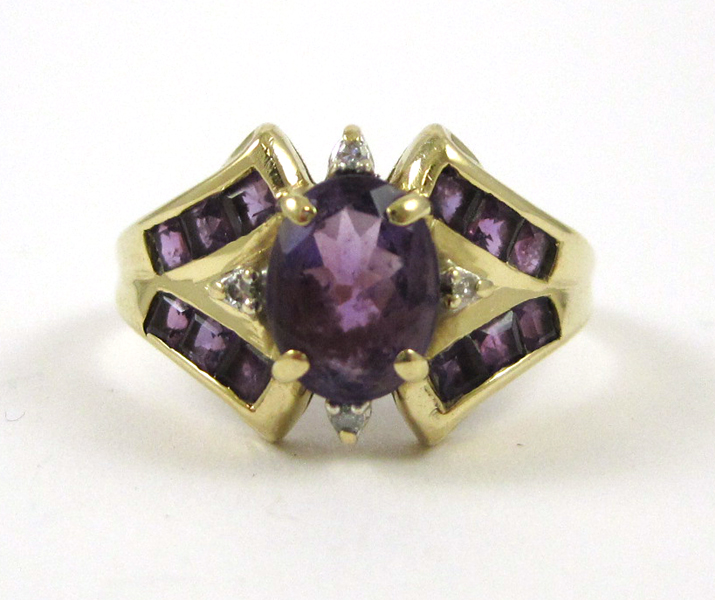 Appraisal: AMETHYST DIAMOND AND FOURTEEN KARAT GOLD RING with four round-cut