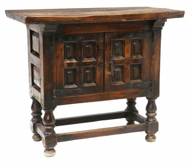 Appraisal: Spanish Baroque style oak cabinet early th c two-board rectangular