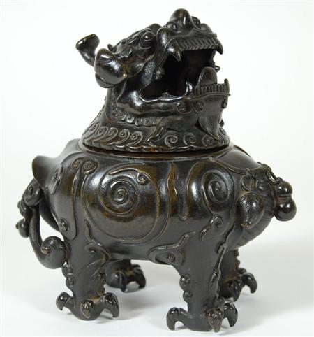 Appraisal: A Chinese th th century bronze Buddhist lion modelled on