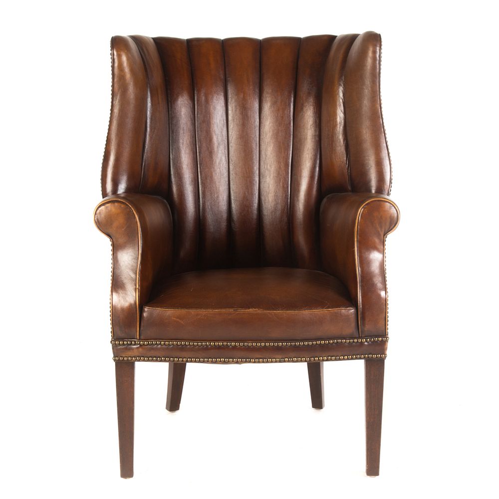 Appraisal: A Georgian Style Leather Channel Back Arm Chair With leather