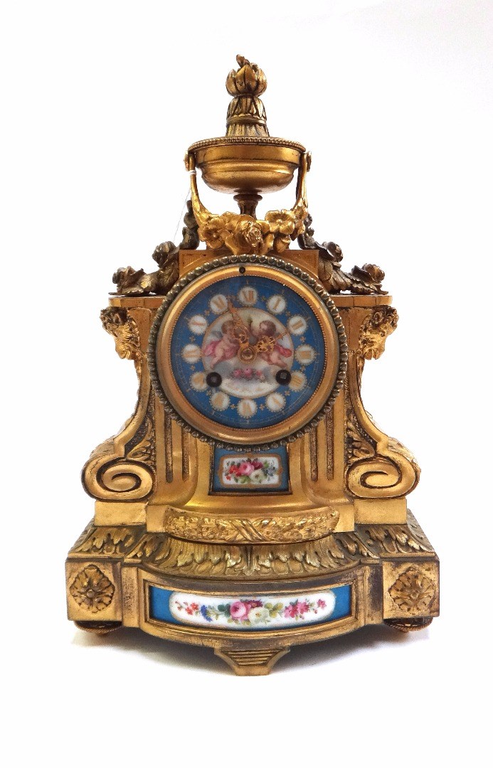 Appraisal: A French gilt bronze and porcelain clock circa the porcelain