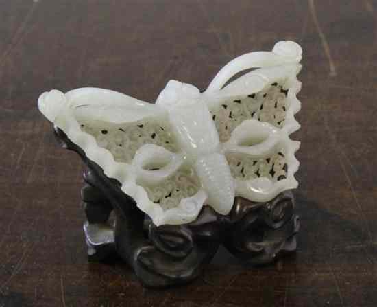 Appraisal: A Chinese pale celadon jade butterfly pendant th century the