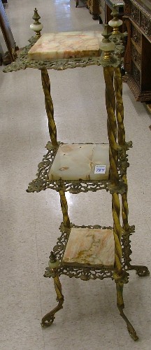 Appraisal: VICTORIAN CORNER BRASS AND CAST IRON WHAT-NOT STAND American late