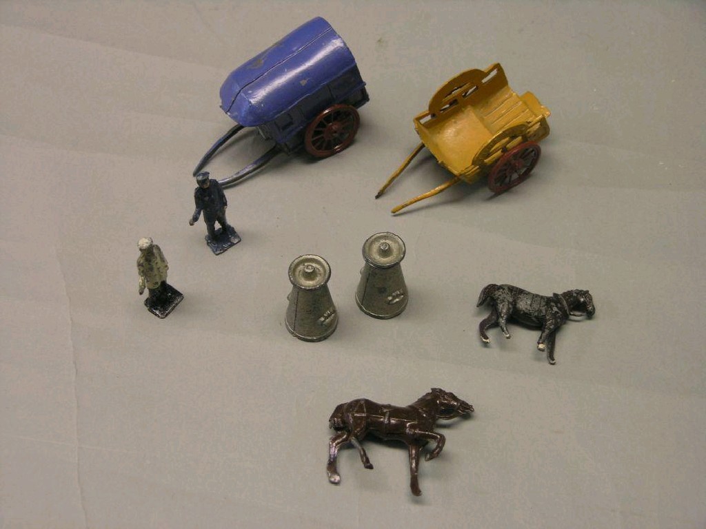 Appraisal: Charbens hollow cast lead toys horse drawn milk cart and