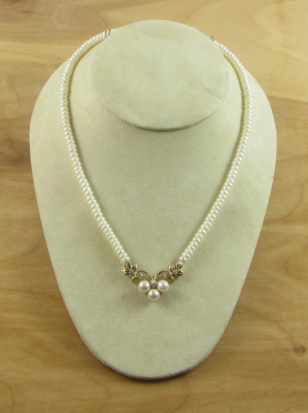 Appraisal: PEARL AND FOURTEEN KARAT GOLD NECKLACE measuring in length with