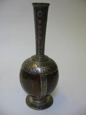 Appraisal: A MIDDLE EASTERN CARAFE th century the coconut shell body