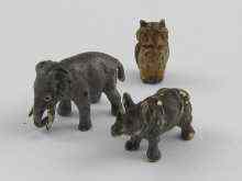 Appraisal: Three miniature bronze animals being an elephant cm an owl