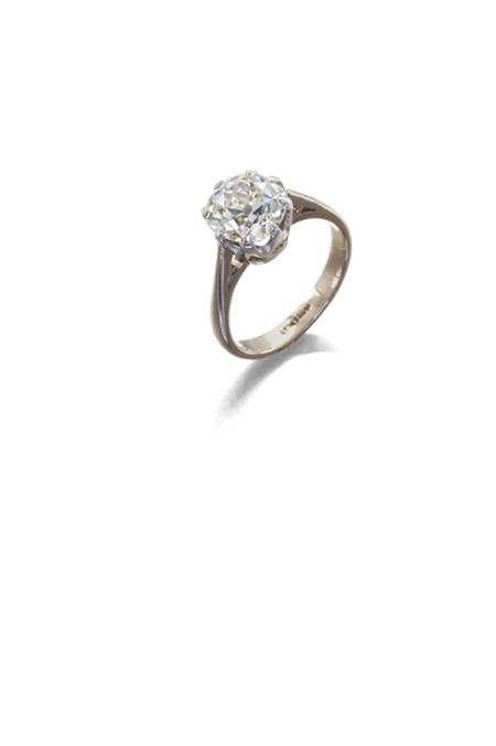 Appraisal: An ct gold and platinum mounted diamond single-stone ring claw