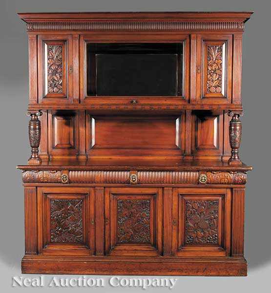 Appraisal: An American Aesthetic Carved Cherrywood and Walnut Sideboard late th