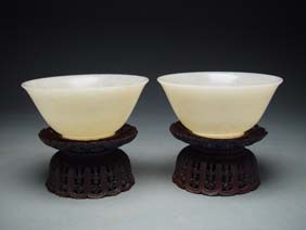 Appraisal: PAIR TH CENTURY JADE BOWLS Pair Chinese th Century Qianlong