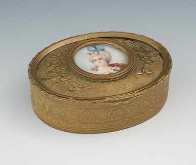 Appraisal: A French Ormolu Miniature Portrait Box Oval shape with hinged