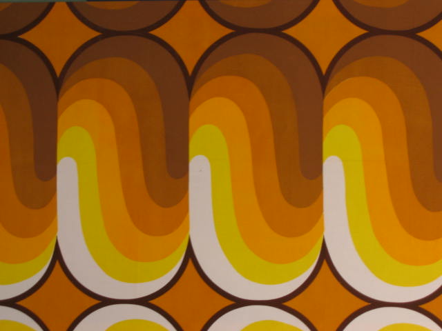 Appraisal: FABRIC WALL HANGING in orange brown and yellow repetitive motif