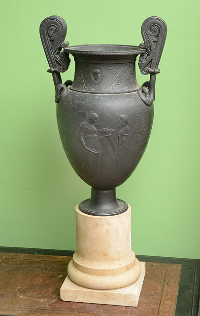 Appraisal: A BLACK PAINTED CAST METAL VASE after the antique with