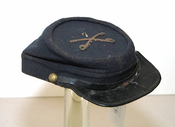 Appraisal: A New York regimental kepi The blue cloth kepi with