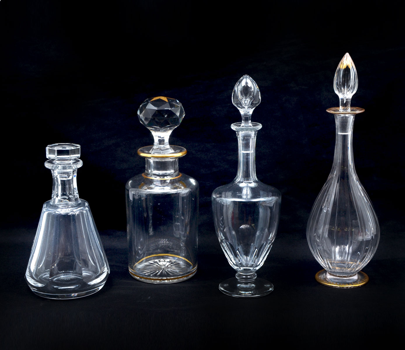 Appraisal: SMALL BACCARAT AND BACCARAT QUALITY DECANTERS Comprising - Ribbed decanter