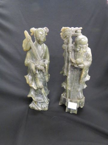 Appraisal: Pair of Chinese Carved Jade Figurines immortal man woman deep