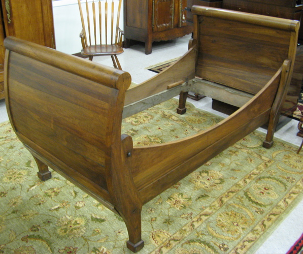 Appraisal: ANTIQUE WALNUT DAY BED French mid th century with scrolling