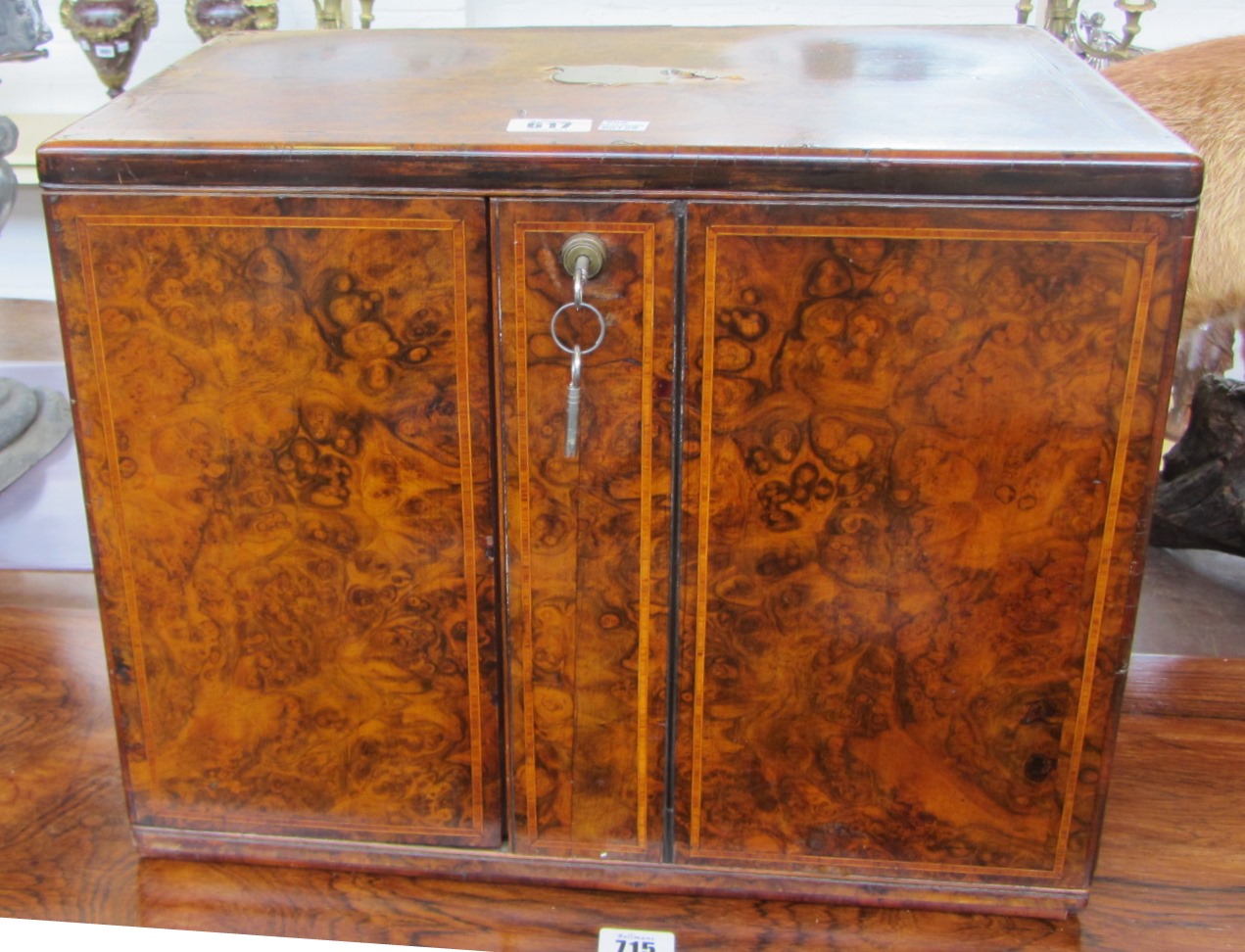 Appraisal: A Victorian figured walnut table top collectors chest with pair