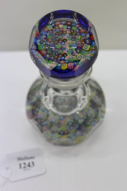 Appraisal: A PERTHSHIRE PAPERWEIGHT CUT GLASS BOTTLE AND STOPPER with coloured