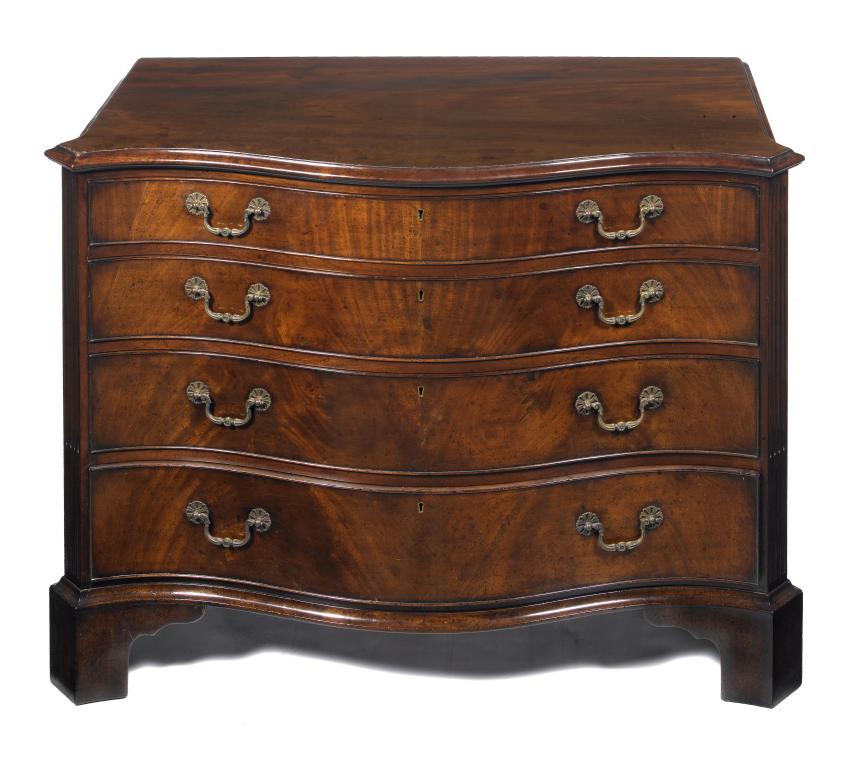 Appraisal: A VICTORIAN MAHOGANY SERPENTINE COMMODE fitted four graduated drawers in