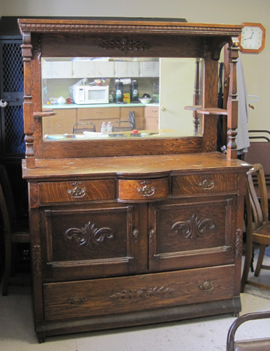 Appraisal: LATE VICTORIAN OAK SIDEBOARD American c having a rectangular mirror