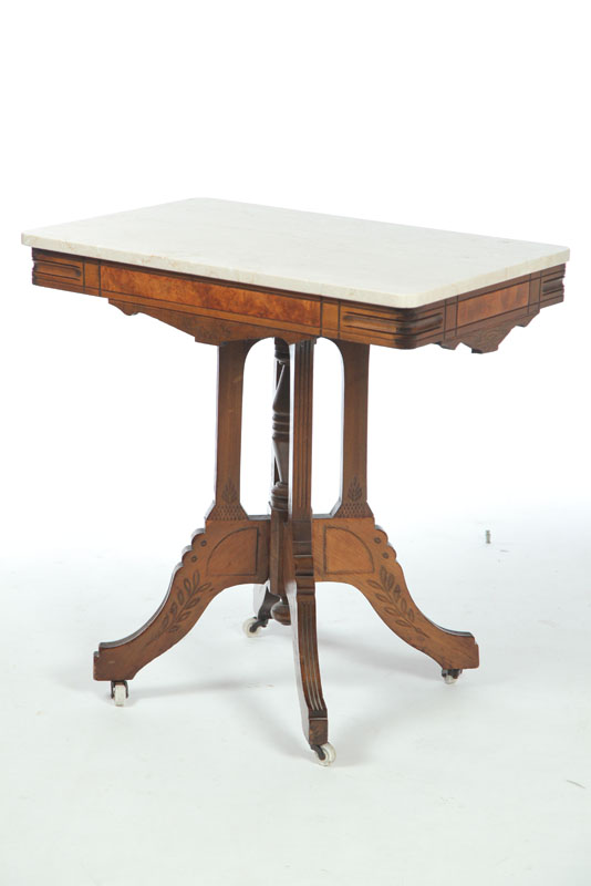 Appraisal: PARLOR TABLE Rectangular marble top having curved corners on a