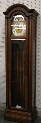 Appraisal: Howard Miller tallcase clock fruitwood case weights with rod chime