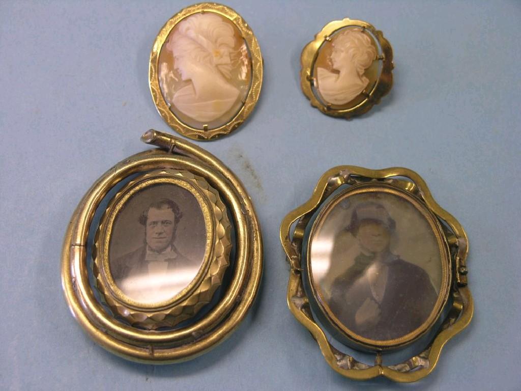 Appraisal: Two rolled gold cameo brooches and two Victorian gold plated