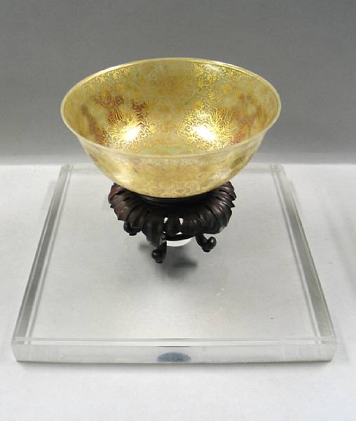 Appraisal: A gilt decorated hardstone bowl The interior wall painted in