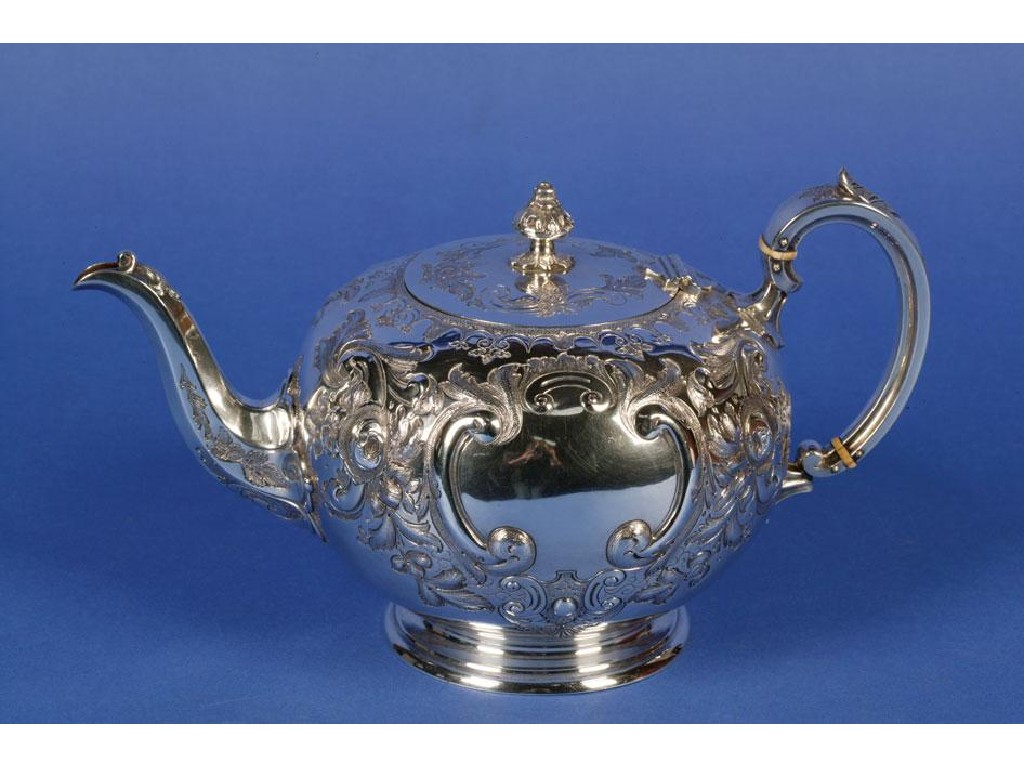 Appraisal: A VICTORIAN TEA POT of circular form with a leaf