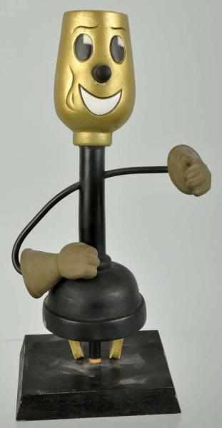 Appraisal: Vinyl Wire Willie Wired Hand Character Description s Wooden base