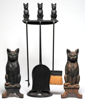 Appraisal: Black Cat Fireplace Tools Andirons Set ca Comprising a pair