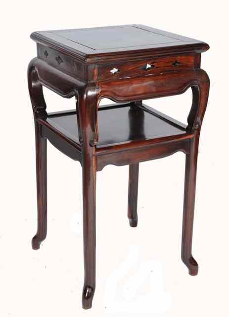 Appraisal: A CHINESE HARDWOOD SQUARE URN TABLE with shaped shelf below