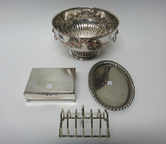 Appraisal: A plated on copper twin handled circular punch bowl embossed