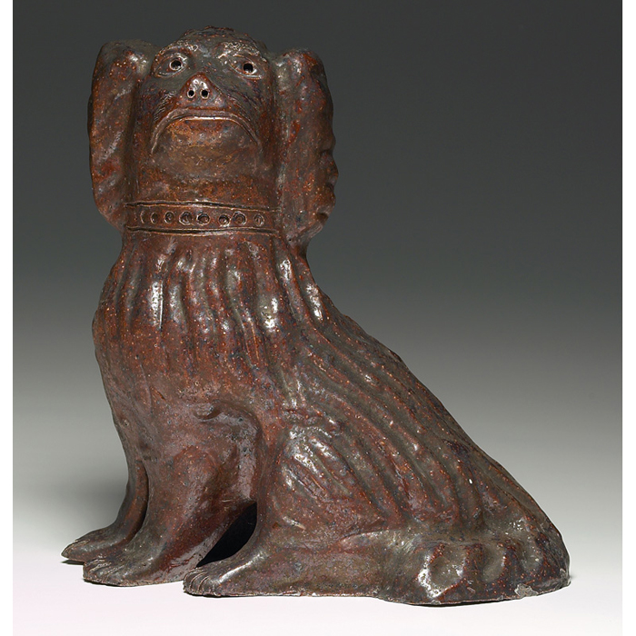 Appraisal: Sewer Tile statue sculpted spaniel covered with a mottled brown