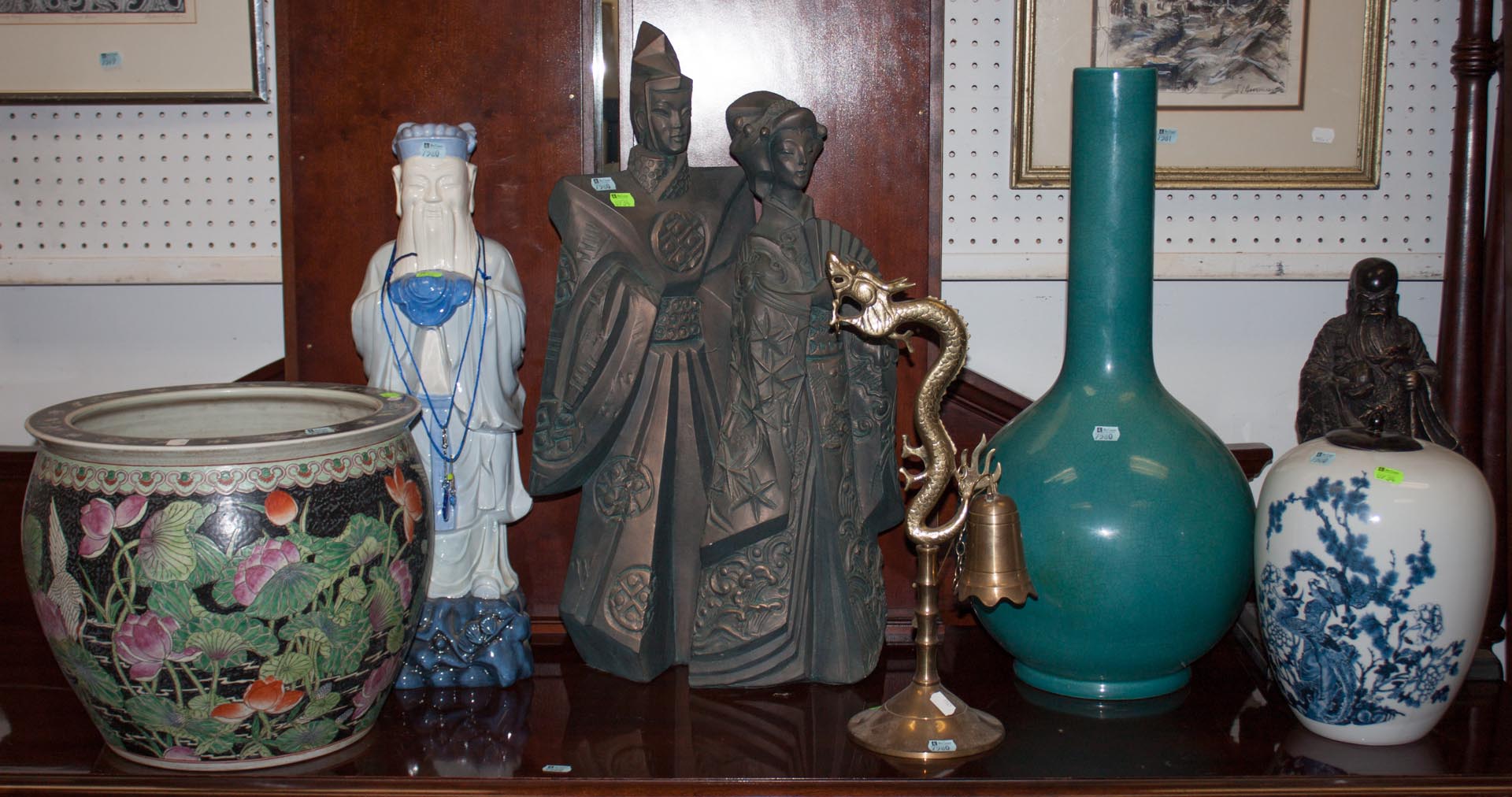 Appraisal: Large assortment of oriental items including figurines urns bell and