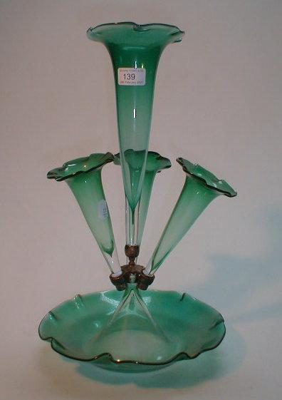 Appraisal: A four trumpet green glass epergne