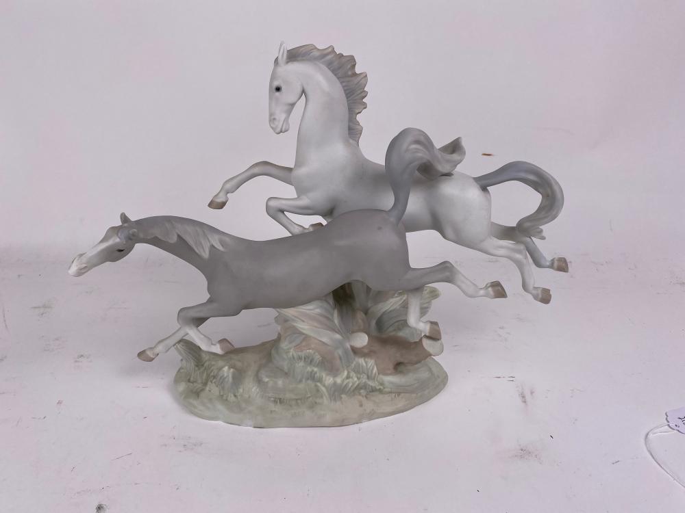 Appraisal: LLADRO PORCELAIN GROUP OF TWO RUNNING HORSESThe underside marked The