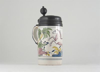 Appraisal: A German fa ence tankard with a pewter cover painted