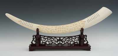 Appraisal: A Chinese Long Carved Double Dragon Ivory Tusk on Rosewood