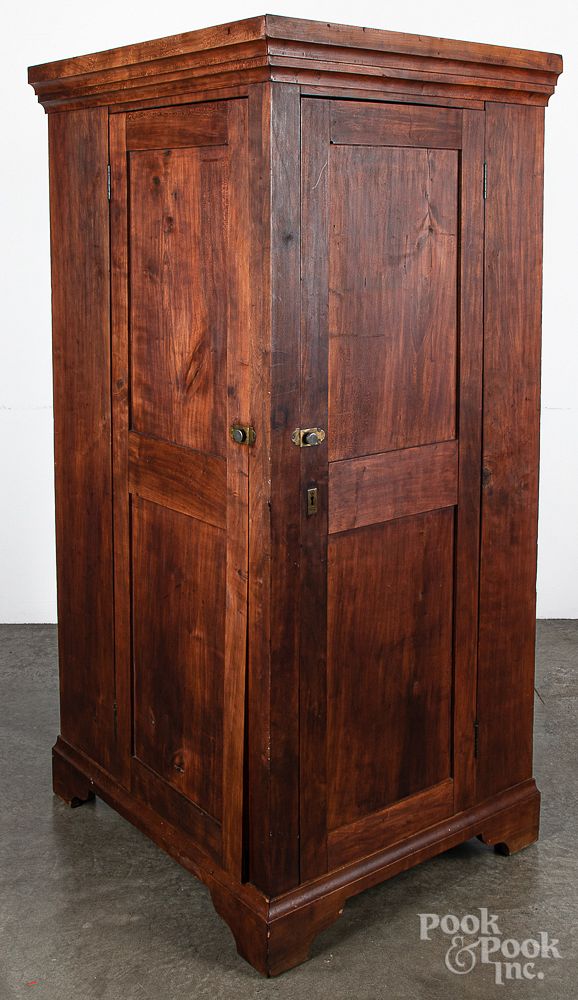 Appraisal: Unusual cherry corner wardrobe th c Unusual cherry corner wardrobe