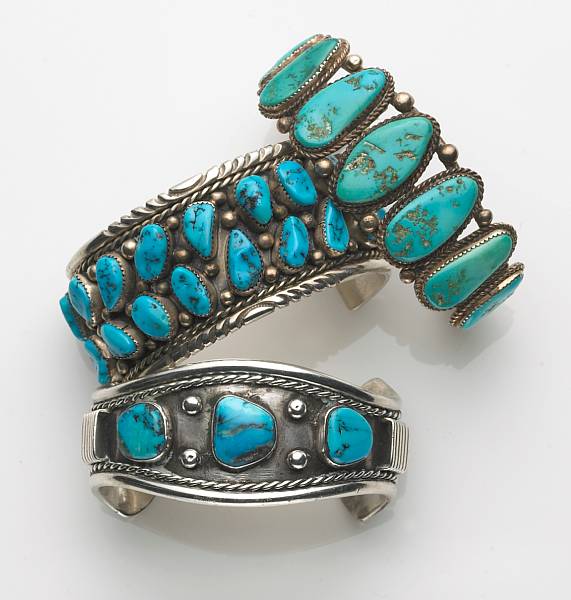 Appraisal: A collection of three Southwest turquoise and silver cuff bracelets