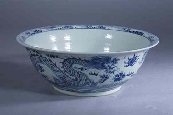 Appraisal: LARGE CHINESE BLUE AND WHITE PORCELAIN DRAGON BOWL Painted in